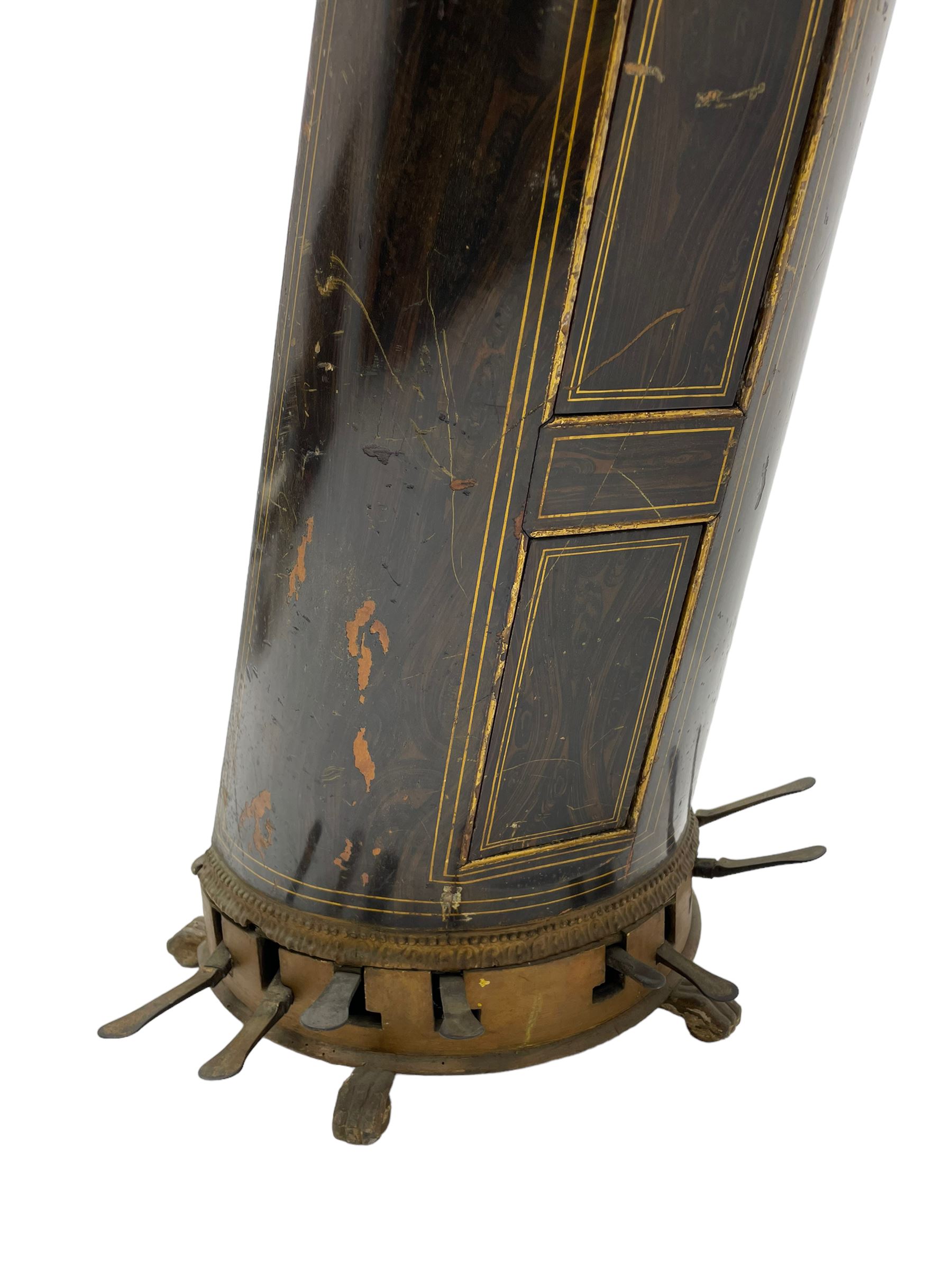 J. Erat. Wardour Street, London, Soho - Regency parcel-gilt and rosewood finish pedal harp, forty-three strings and five swell doors, the fluted pillar decorated with rams head capital, floral festoons, anthemion motifs and sarcophagi, the base decorated with pharaonic motifs and fitted with eight brass pedals, on carved paw feet, brass signature plate to top inscribed 'J. Erat. Wardour Street, London, Soho, 606'
