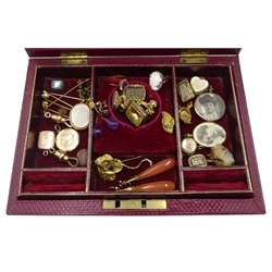Early 20th century tooled leather jewellery box, velvet and silk lined containing Victorian and later 9ct and 15ct gold jewellery, stone set pinchbeck seal fobs, mourning brooches, stick pins, lockets and earrings