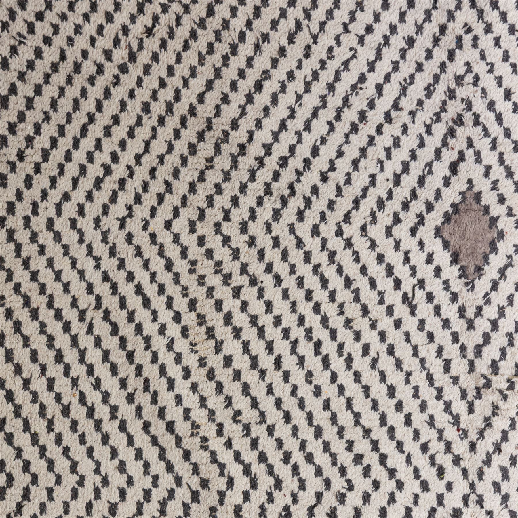 Contemporary Beni Ourain style wool rug, woven with a cream field and dark brown geometric chevron lattice, centred by repeating small diamond medallions, with short fringe ends