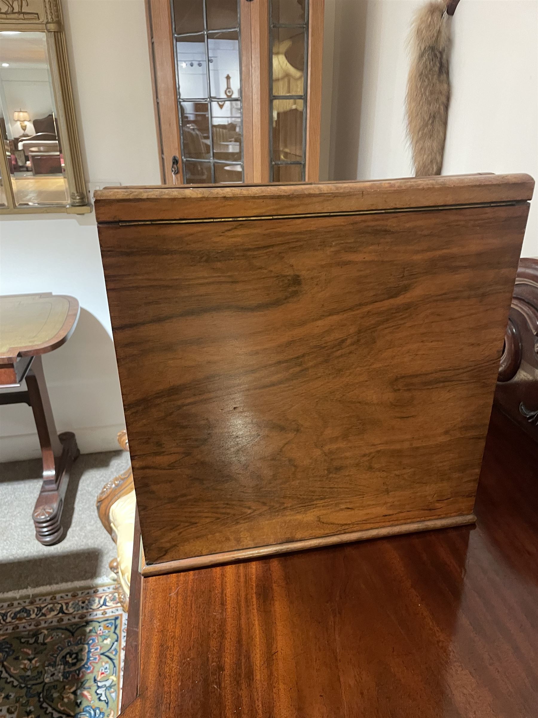 19th century burr walnut correspondence box, the sloped front opening to reveal a fitted interior with perpetual calendar, letter racks, and pen tray between two inkwell recesses, above a pull out draw with recessed brass handle, H41cm L40.5cm D28.5cm