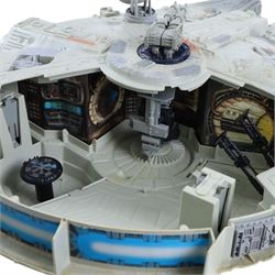 Two Star Wars Millennium Falcon models, comprising Kenner Power of the Force and a custom painted example, largest L72cm