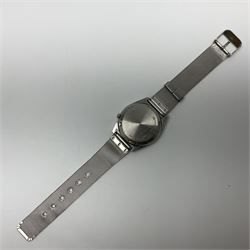 Seiko 5 gentlemans automatic stainless steel wristwatch, with blue dial, yellow markers and day/date apeture, ref no. 7009-3171, on stainless steel strap