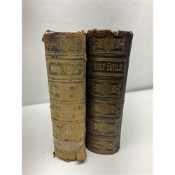 Two 19th century leather bound Browns self interpreting family bibles with colour lithographic book plates, H34cm