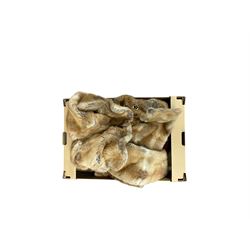 Collection of fur stoles and a fur coat 