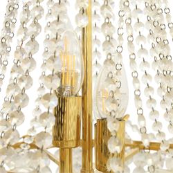 Art Deco style set of two chandeliers, brass and beaded glass, (H 60cm, Di 60cm) (H 75cm, Di 62cm) 