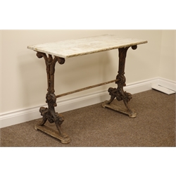  19th century cast iron table moulded with lion masks and paw feet, rectangular white marble top, 91cm x 47cm, H70cm  