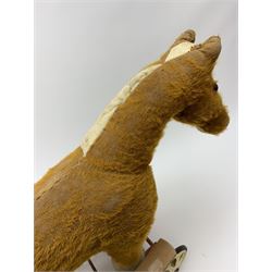 Pedigree push along plush covered horse 1950s-60s with red tubular metal framework and beech foot rests H25