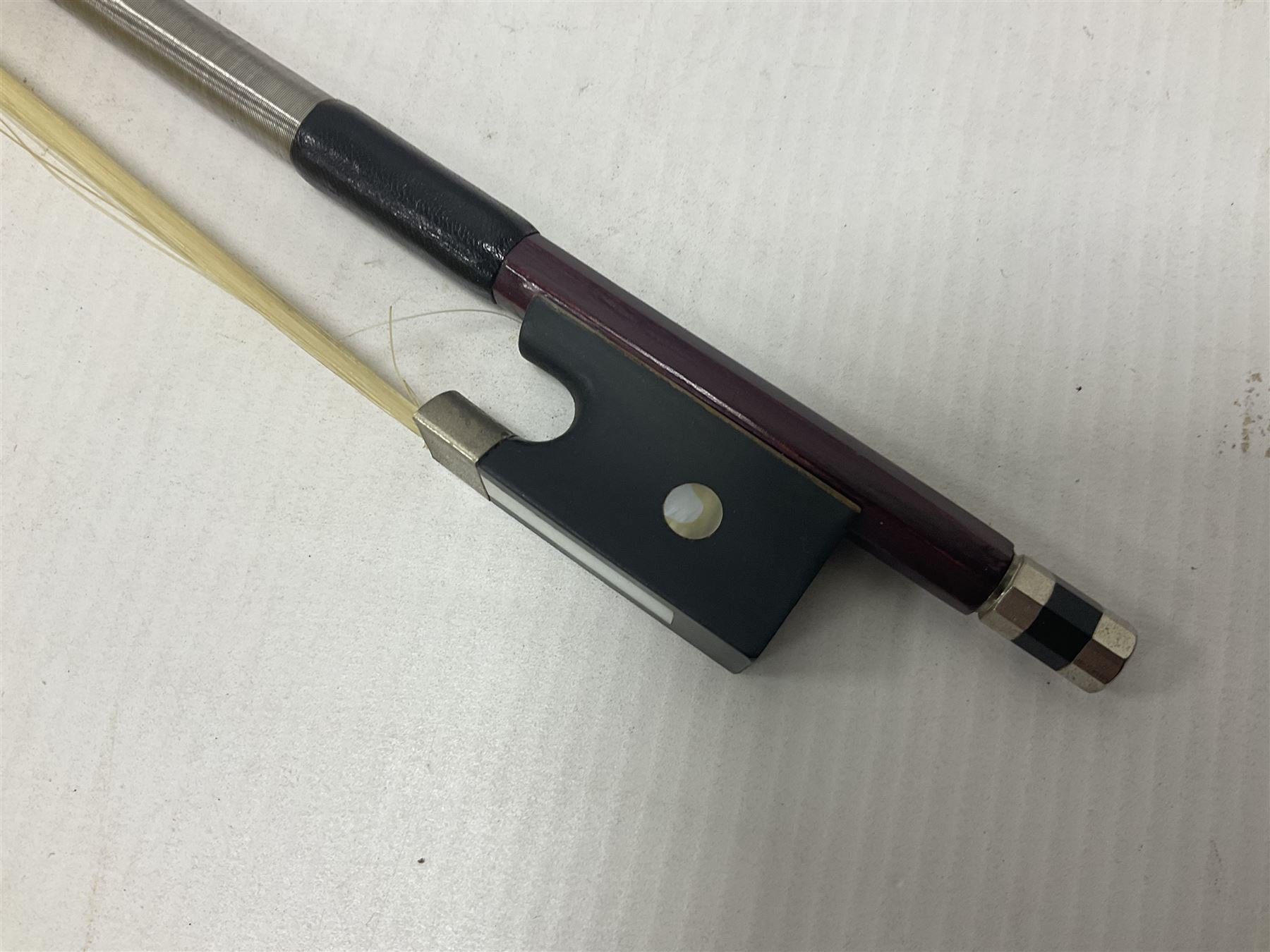 Intermusic 3/4 violin with a violet coloured solid wood body, ebonised fingerboard and fittings, bow and hard case, length 54cm