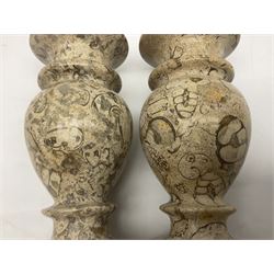 Pair of vases, of baluster form upon a stepped foot, with shell inclusions within the limestone, H15cm  