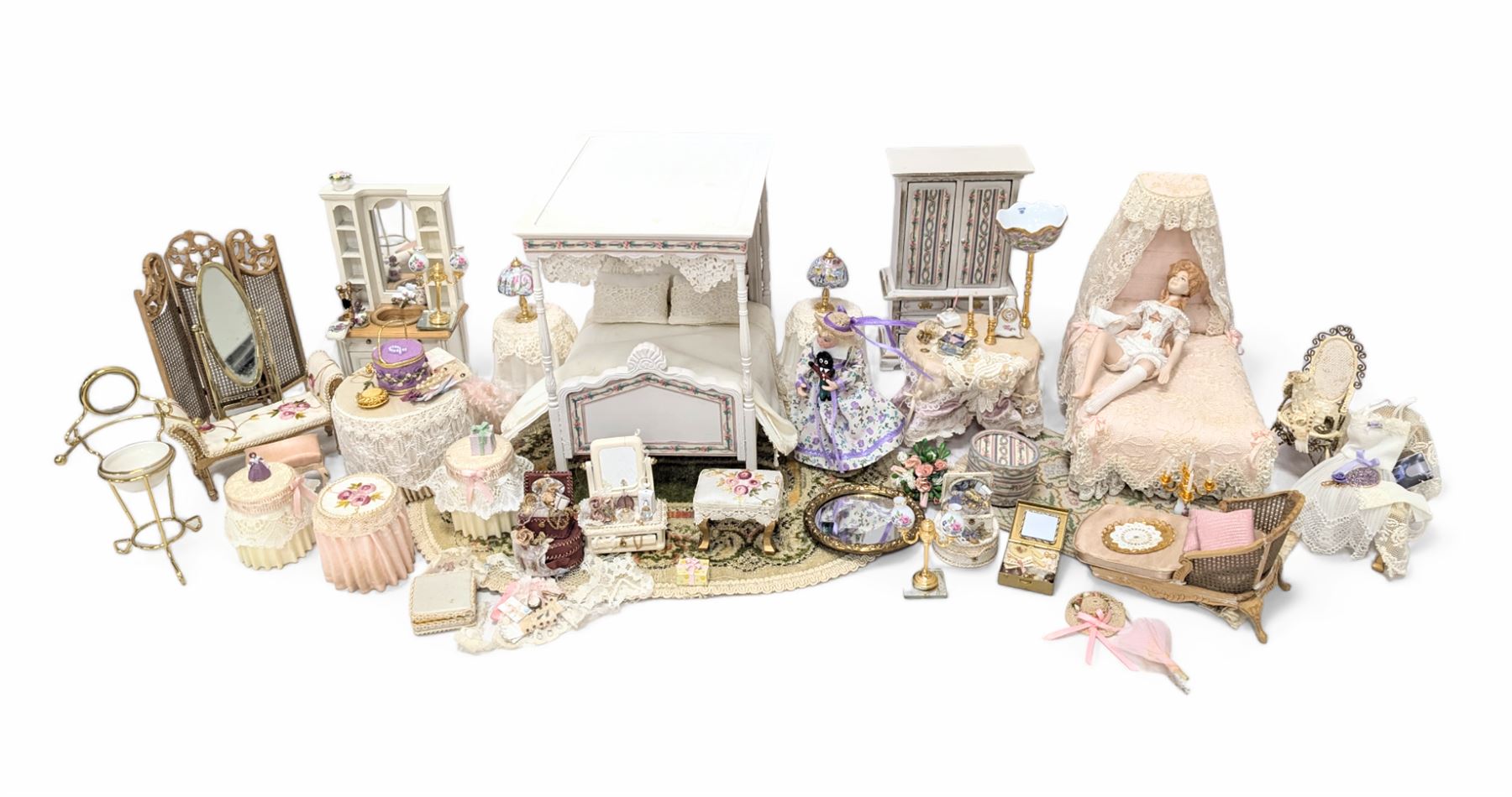 Dolls house bedroom and dressing room furniture, including beds, wardrobe, dressing table, lamps, tables, two figures and a collection of accessories