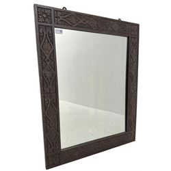 Late 19th century oak wall mirror, carved strapwork rectangular frame, plain mirror plate