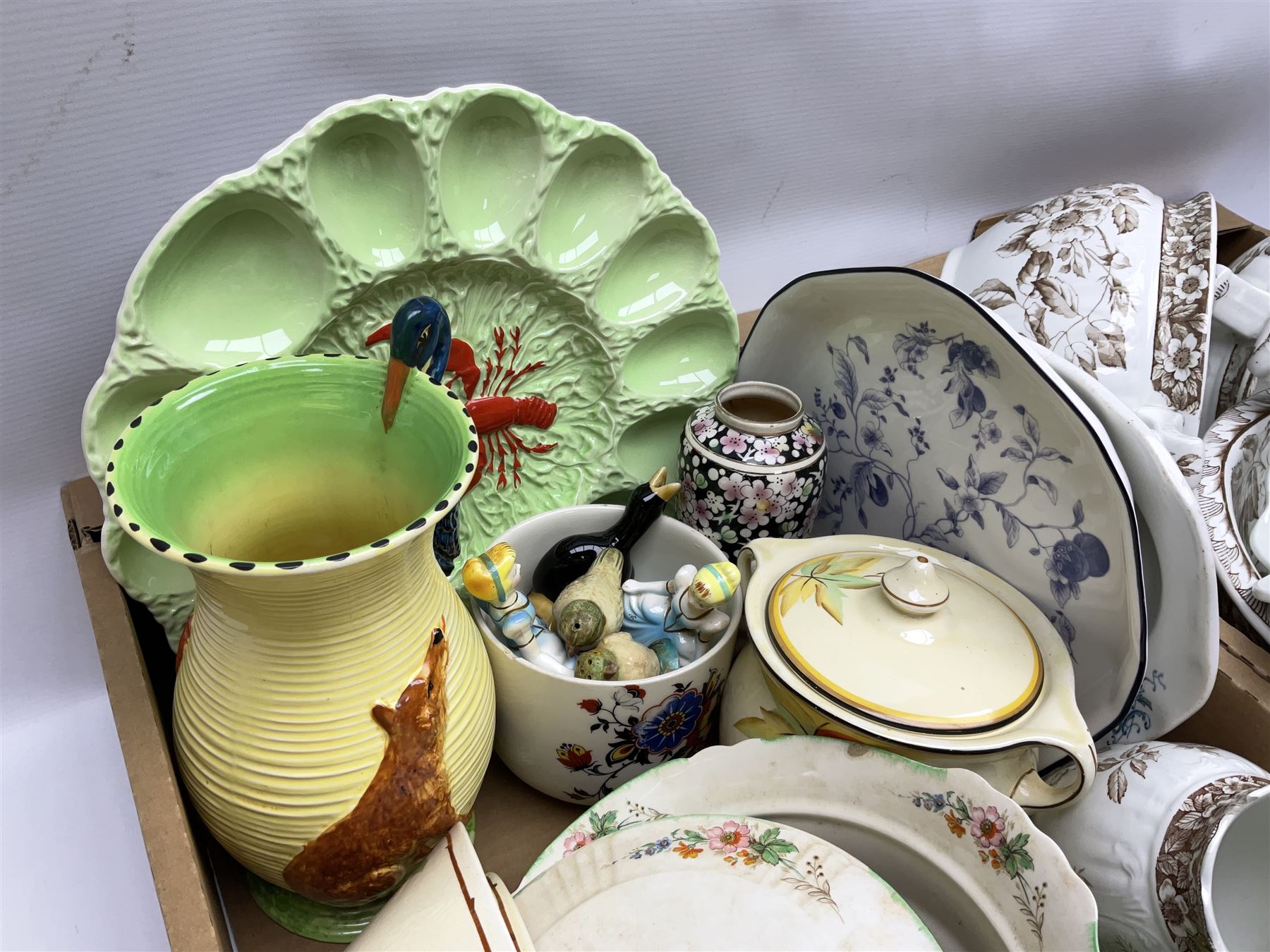 Burleigh Ware jug of baluster form modelled with fox and heron, cabbage dish, Carlton Ware lobster scallop dish, Royal Doulton The Hunting Man plate, Grimwades, other early 20th century ceramics and a Henry Alcock wash set to include jug and bowl, chamber pot etc