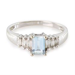 10ct white gold aquamarine and diamond ring, single octagonal cut aquamarine of approx 0.45 carat, with three tapered baguette cut diamonds set either side, stamped