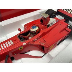 Four Paul's Model Art 1:18 scale Michael Schumacher Collection die-cast racing cars - Ferrari F310B; Ferrari F310/2; Benneton Renault B195; and Ferrari F300; all boxed (4)