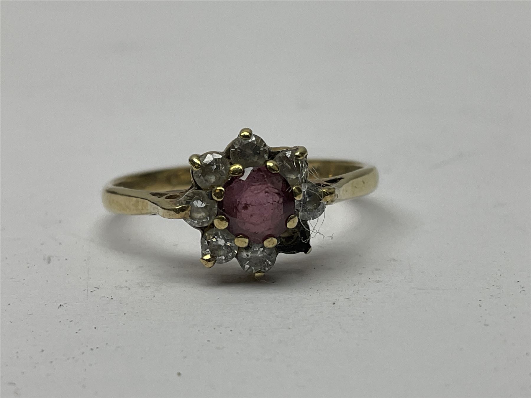 9ct gold pear butterfly brooch, 9ct gold stone set ring and an silver fob watch, all stamped or hallmarked 