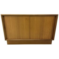G-Plan - mid-20th century teak 'E-Gomme' side cabinet, enclosed by two sliding cupboard doors, on plinth base