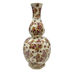 Mid 20th century Boch Freres of Belgium Keralux Fleur De Saxe vase, of double gourd form with pink and yellow flowers amongst orange foliage and gilt decoration, H44cm