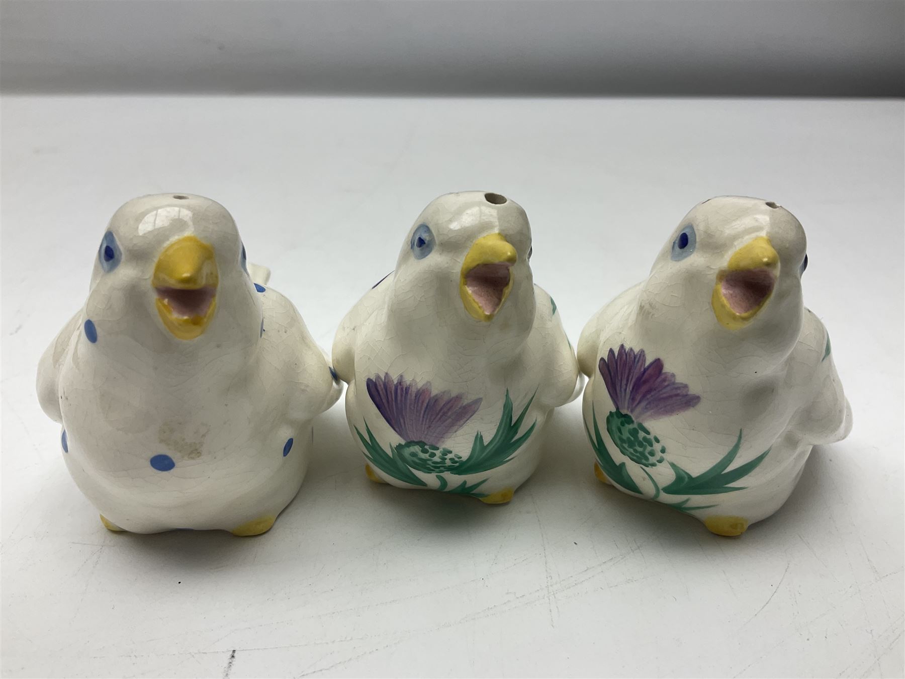 Three Plichta shakers modelled as birds