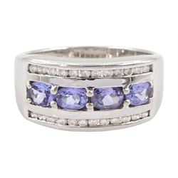 14ct white gold three row oval cut tanzanite and round brilliant cut diamond ring, stamped