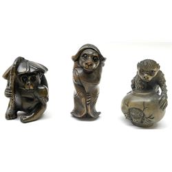 Three netsuke, modelled as monkeys 