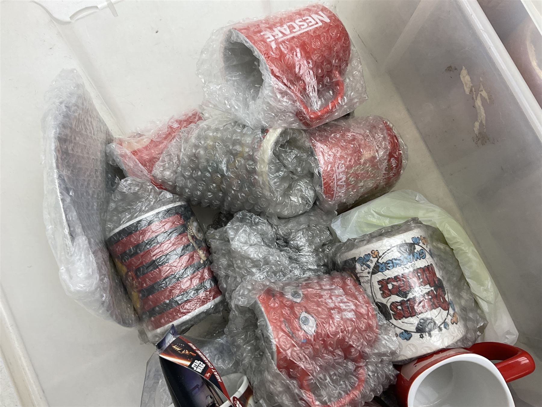 Quantity of Nescafe memorabilia and merchandise, and various mugs, Star Wars etc in two boxes