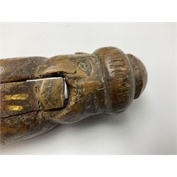Rare primitive treen lever action nutcracker, probably late 17th/early 18th century, carved in the form of a man, with old collector label to side inscribed 'A Nutcracker XVI Century', H18cm