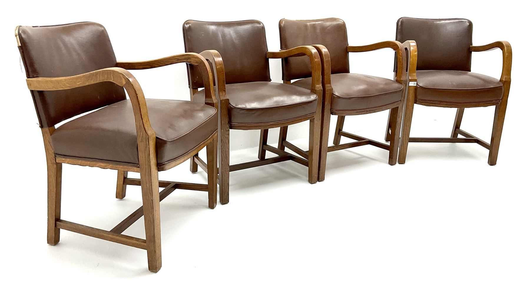 Set four mid century oak framed boardroom chairs, upholstered back and