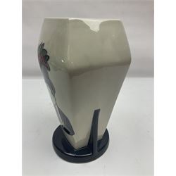 Charlotte Rhead for Crown Ducal ceramics, comprising coffin shaped vase depicting a woman in 1920s dress, a vase with handle, decorated with autumn leaves and a bowl, decorated with flowers and berries, with printed and signed marks beneath, coffin vase H24cm