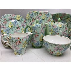 Shelley Melody pattern tea service for six, to include teapot, teapot stand, hot water jug, milk jug, covered sucrier, teacups and saucers, cake plates etc (31)