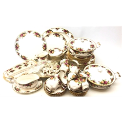  Royal Albert Old Country Roses dinner and tea service comprising eight dinner plates, two cake plates, oval platter, six napkin rings, salt & pepper pots, serving dishes, eight bowls, eight cups, six saucers, ten tea plates, eight side plates, gravy boat and saucer, milk jug, two tureens etc  