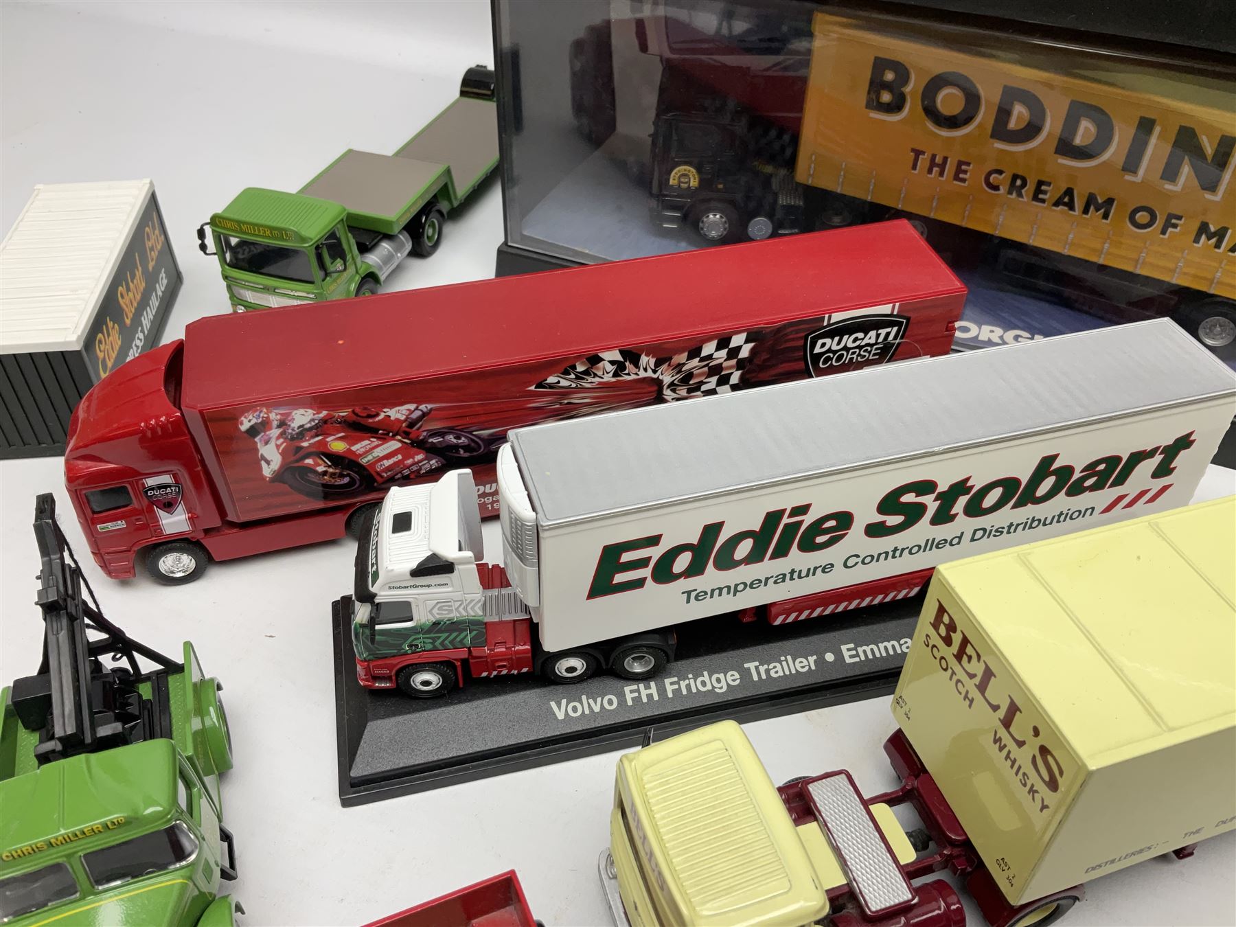 Corgi - two perspex cased 'Modern Trucks; 75202 ERF Curtainside Boddingtons and 75402 Leyland-DAF Curtainside Tate & Lyle; and nine unboxed Corgi lorries (11)