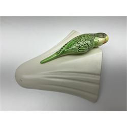 Sylvac budgieregar wall pocket, together with other Sylvac cermics including swan vases, blue tit vase and a frog figure etc, all with printed or impressed marks beneath, and a Poole Pottery cat figure, with printed mark beneath, wall pocket H22cm