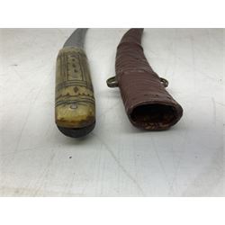 Caucasian qama or kindjal dagger, the 15cm pointed double edged blade with centre fuller and two-piece horn grip;  in nickel plated scabbard with panels of figures and script L28.5cm overall; and eastern knife with 20.5cm curving blade and decorative horn grip; in leather covered scabbard (2)