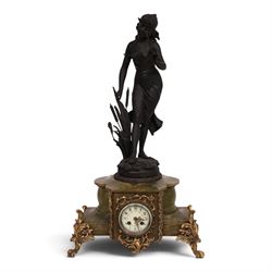 French green onyx clock, surmounted by a female figure amongst rushes, the enamel clock face with floral sprigs, H74cm 