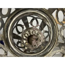 20th century silver specimen vase, of pierced trumpet form with flared rim, filled base, and blue glass liner, hallmarked Birmingham 