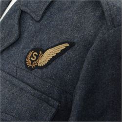 WWII Royal Air Force battle dress blouse, belonging to Flight Sargent Colin Scott 3011422, dated 1945, tailors label for M & N Horne Ltd 1945, Size No 7, blue cloth, Signaller cloth brevet, wireless officers patch to right sleeve and braid sergeant stripes to both sleeves, together with his flight log book, postings & Movements, Royal Air Force Service and Release Book, photographs etc  