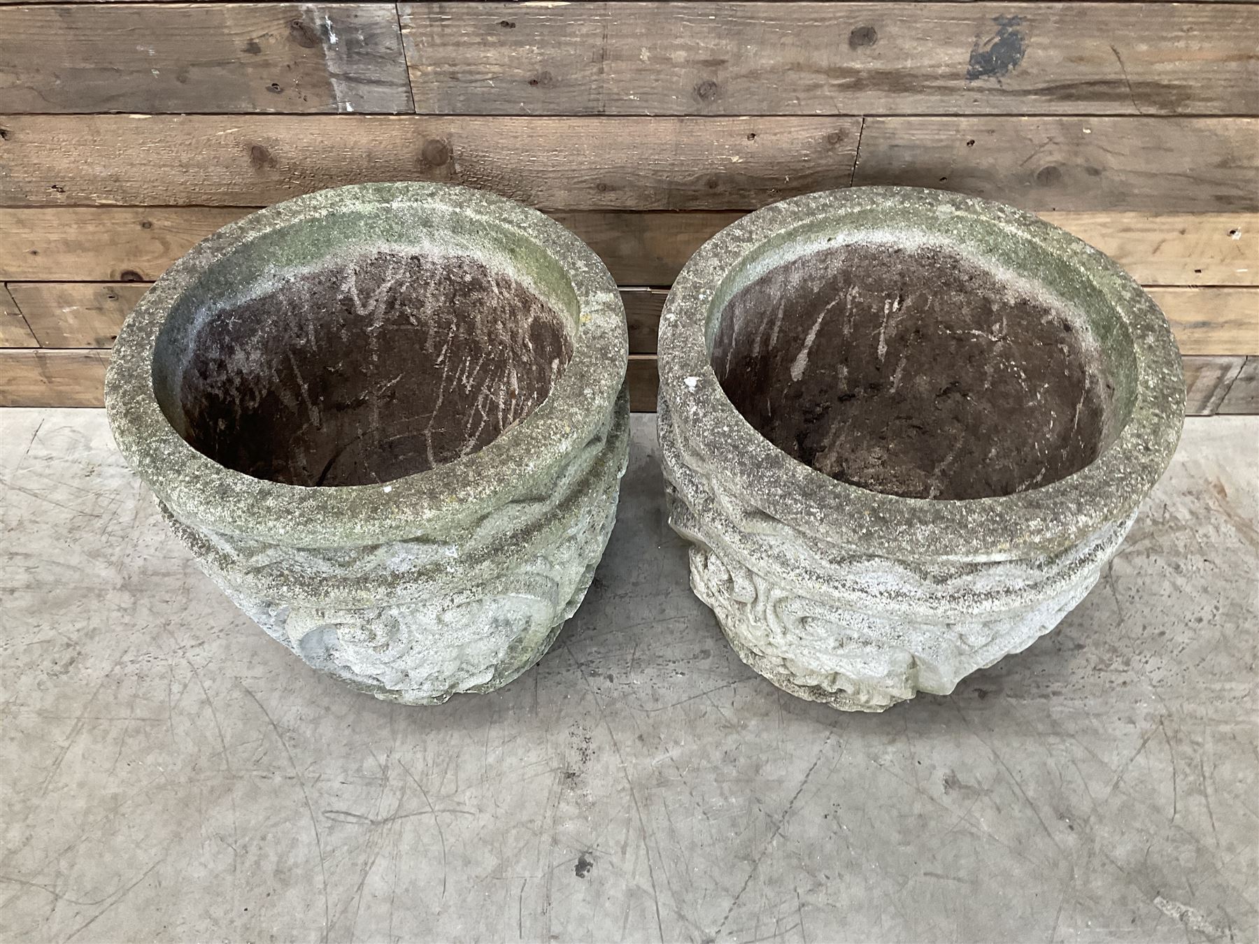 Pair of cast stone ornate circular planters