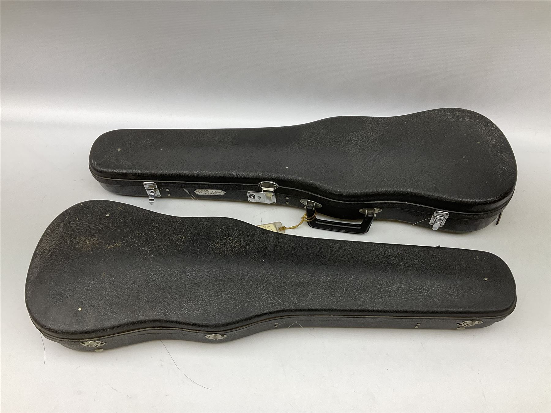 Two cased Skylark violins with bows, largest violin L59cm 