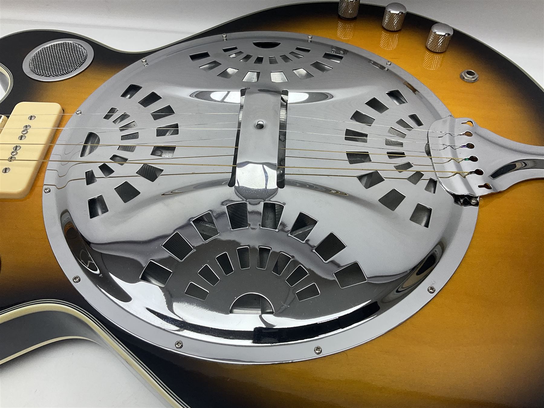 Eastwood of Canada Delta 4 electric four-string tenor resonator guitar with tobacco sunburst finish, serial no.1703437 L100cm; in original soft carrying case