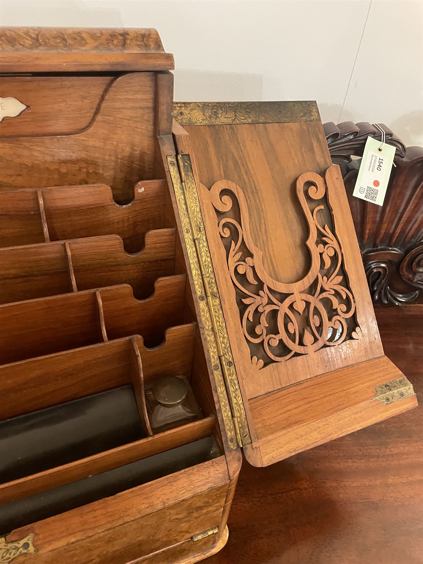 19th century burr walnut correspondence box, the sloped front opening to reveal a fitted interior with perpetual calendar, letter racks, and pen tray between two inkwell recesses, above a pull out draw with recessed brass handle, H41cm L40.5cm D28.5cm