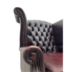 Thomas Lloyd - Georgian style wing back armchair, upholstered in buttoned oxblood leather
