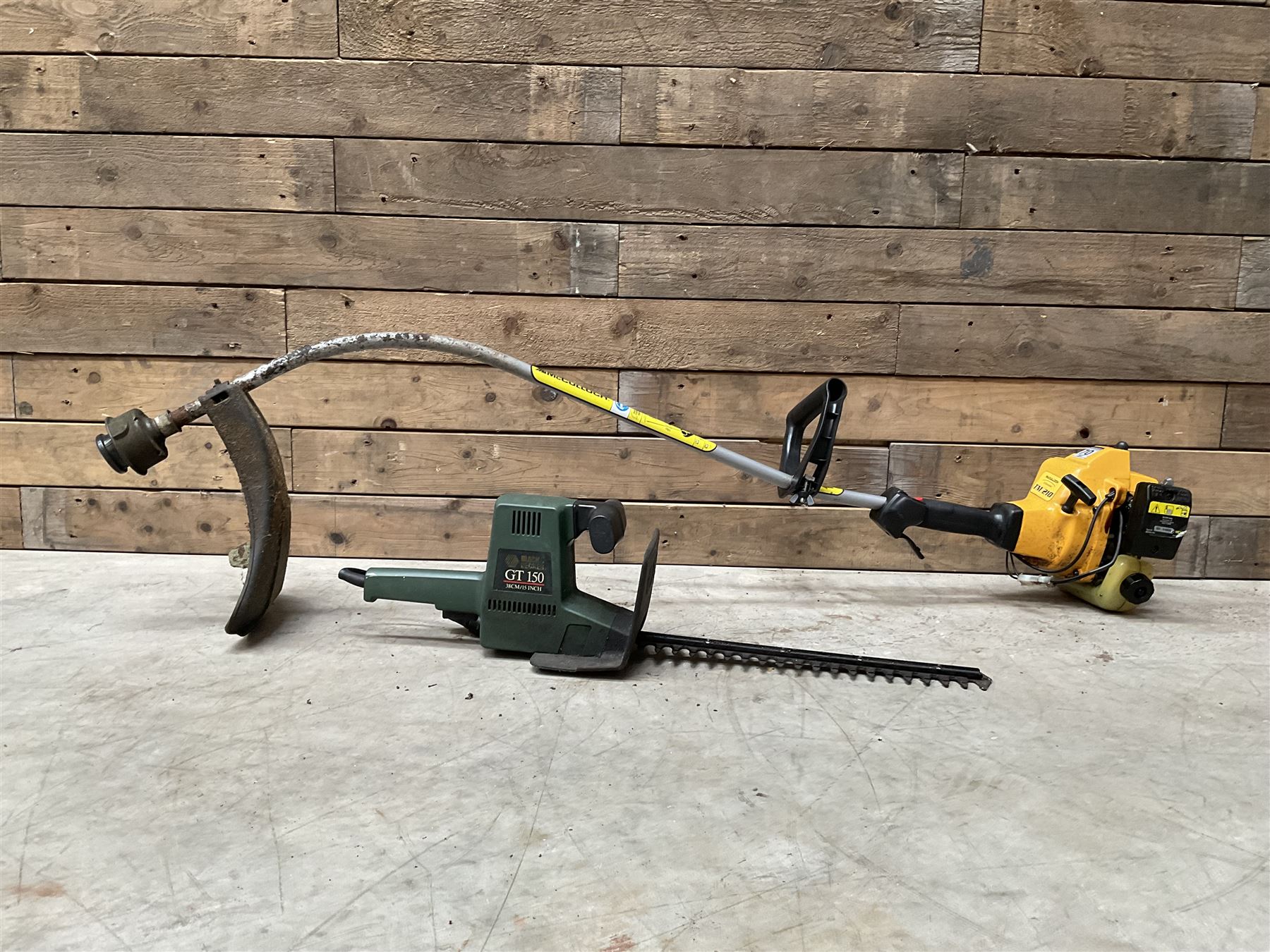 McCulloch TM210 petrol strimmer and a Black & Decker GT150 hedge cutter   