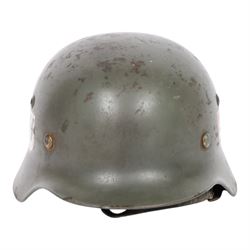 German Third Reich Waffen-SS M35 double decal helmet, the left inner brim stamped SF64, th...