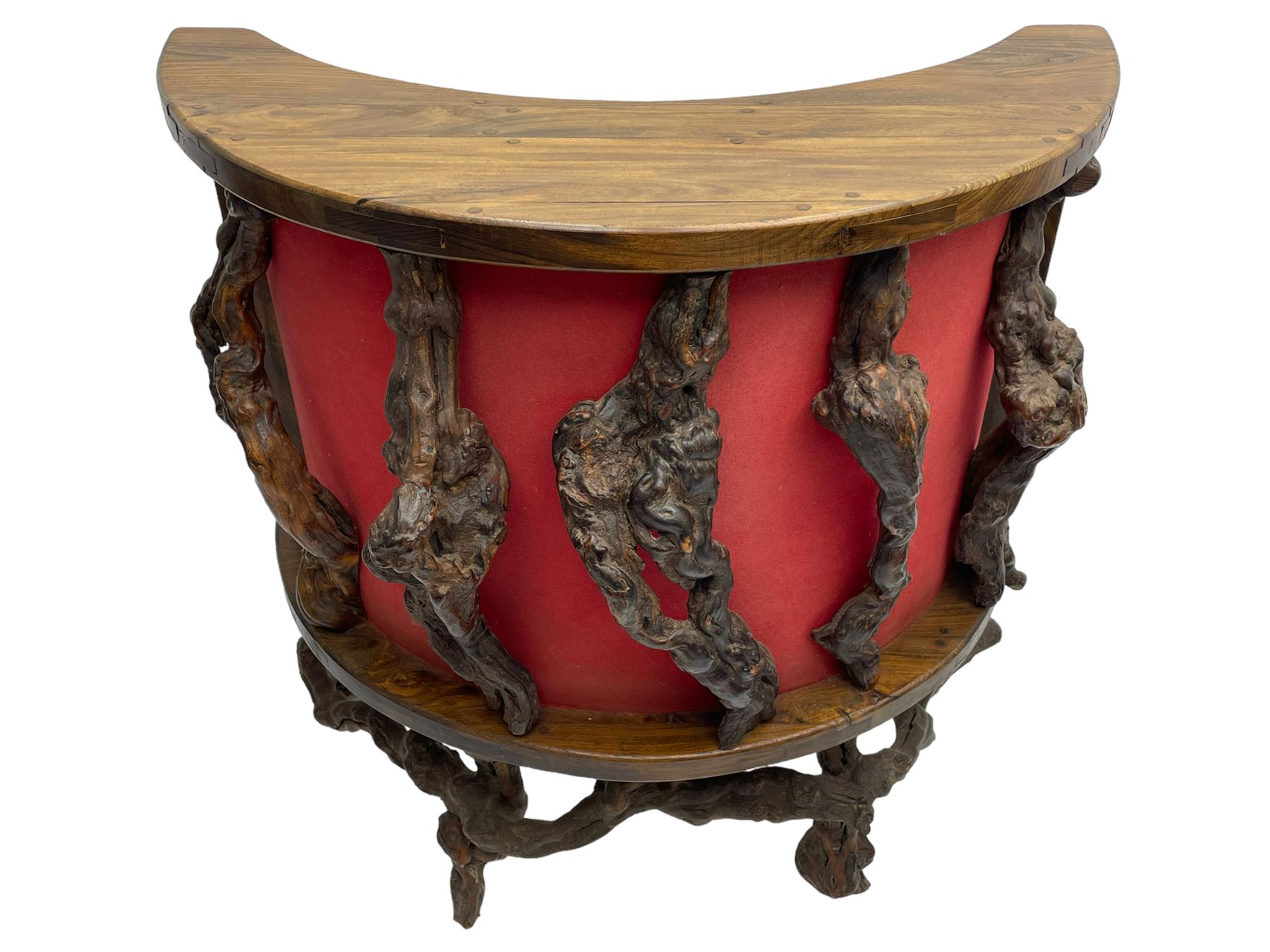 Mid-20th century French grapevine and walnut bow-front wine tasting bar, the curved counter top supported by sculptural grapevine roots, fitted with single shelf and raised on rustic vine feet (W100cm H101cm); with a pair of matching bar stools, the circular top raised on three gnarled root supports united by stretchers (W50cm H70cm)