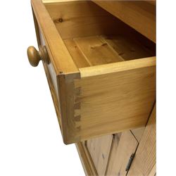 Traditional pine dresser, the rack fitted with two shelves flanked by glazed cupboards, the base with three drawers over three panelled cupboards