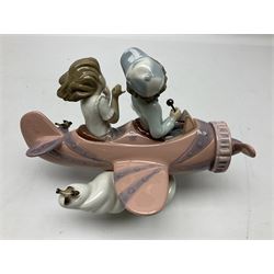 Lladro figure, Don't Look Down, modelled as a girl and boy in a plane, sculpted by Joan Coderch, no 5698, year issued 1990, year retired 2004, H17cm