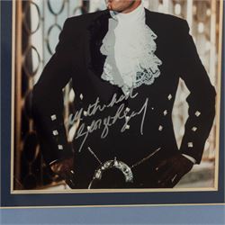 James Bond 40 years 20 films signed commemorative montage, comprising signed photographs of Sean Connery, George Lazenby, Roger Moore, Timothy Dalton and Pierce Brosnan, each with a certificate of authenticity from UACC Dealer Lester Freeman, framed, frame H79cm, W100cm