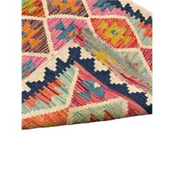 Anatolian Turkish Kilim ivory ground runner rug, decorated with all over multi-colour geometric lozenges with ivory outline