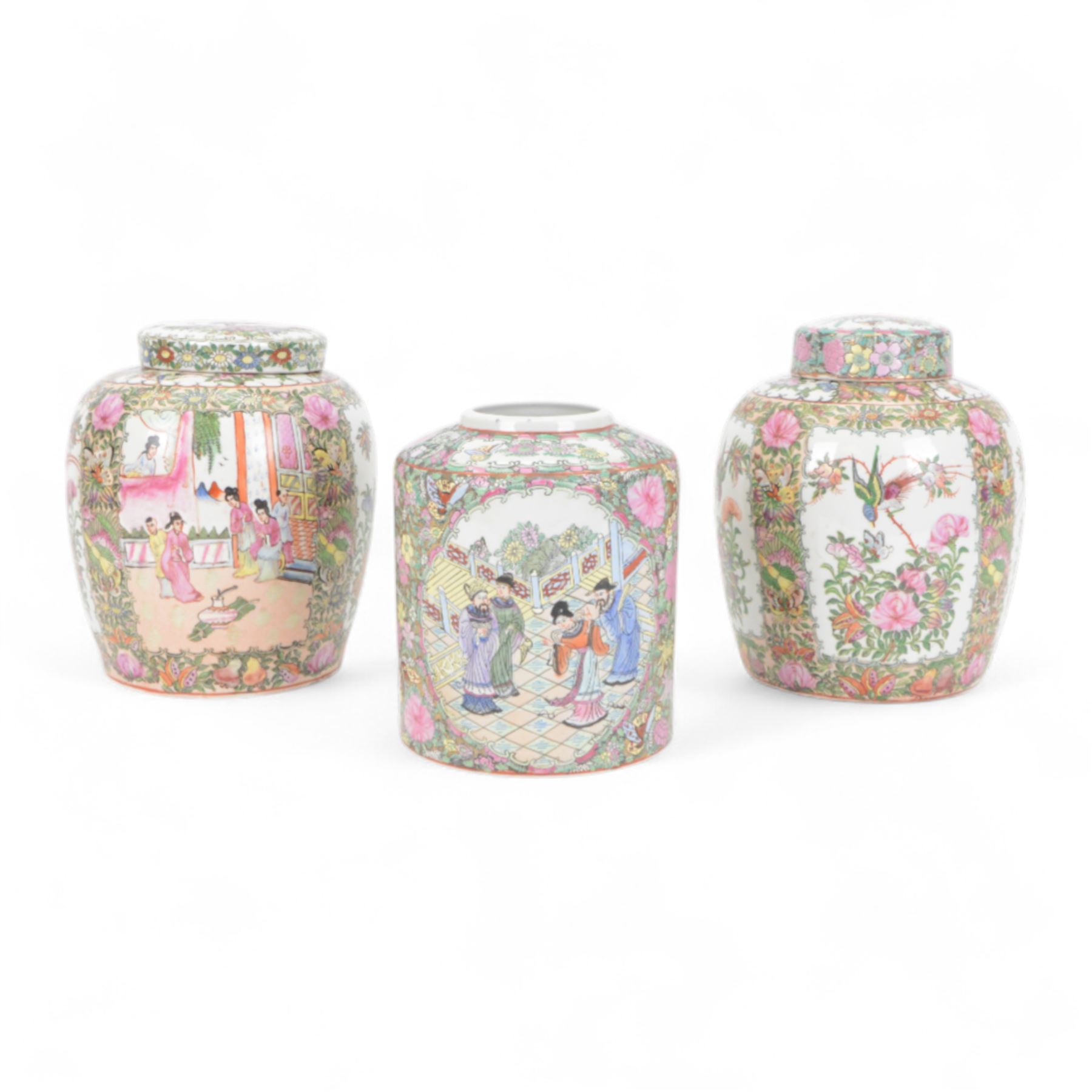 Two Canton famille rose ginger jars and covers, one decorated with birds in blossoming branches, the other with figures in a temple, together with one other jar, H30cm