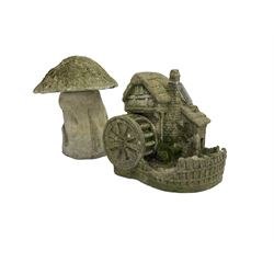 Composite stone garden ornament in the form of a mushroom together with another similar of a windmill (2)